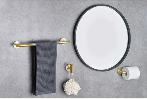 Dope Brushed Gold Bathroom Hardware Set Includes 16 Inch Hand Towel Bar And Toilet Paper Holder And Two Robe Hooks In Durable SUS304 Stainless Steel For A Slick Modern Bath Update displayed against a gray wall with a mirror.