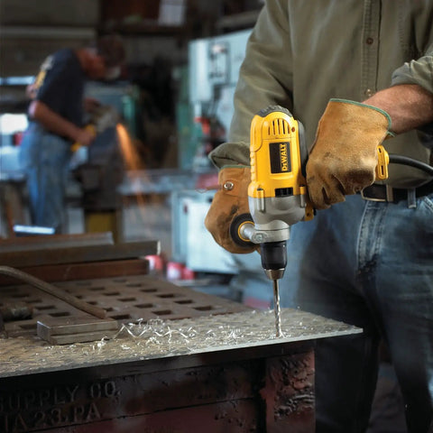 Person using corded drill powerhouse with 1/2-inch chuck, 10 Amp motor, mid handle grip, all metal single sleeve ratcheting keyless chuck
