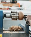 Lathe Spindle Adapter For Woodworking Converts One And A Quarter Inch 8TPI Female To One Inch 8TPI Male External Threads in use
