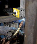 Heavy Duty Magnetic Welding Square Base Clamp Holder with Rock Solid 1050 Lbs Grip, securing steel during welding.