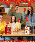 Group celebrating with 48 Count Firetruck Party Favors With Handles Bulk Pack For Kids Birthday Firefighter Candy Treat Bags on table