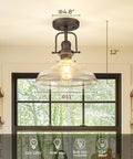 Farmhouse Semi Flush Ceiling Light With Slick Oil Rubbed Bronze Finish And Clear Glass Shade For Kitchen And Bedroom Vintage Rustic Industrial Style 11 Inch Flush Mount Fixture displayed in kitchen setting with measurements
