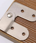 Close-up of a heavy-duty metal hinge from the Built Tough Ladder Folding Hinge Heavy Duty Invisible Tabletop Bracket set.