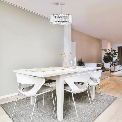 Modern Crystal Flush Mount Ceiling Light Fixture Dope With 12 Inch Round Crystal Shade over dining table in contemporary room