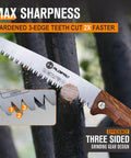 Close-up of Seven Inch Folding Hand Saw With Wenge Wood Handle and Premium Leather Sheath cutting a branch, showing blade teeth