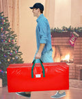 Person carrying Christmas Tree Storage Bag Fits Up To Seven And A Half Foot Tree Zippered With Carry Handles Heavy Duty