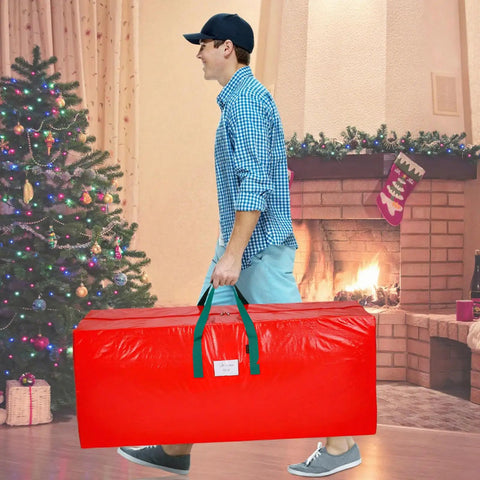Person carrying Christmas Tree Storage Bag Fits Up To Seven And A Half Foot Tree Zippered With Carry Handles Heavy Duty
