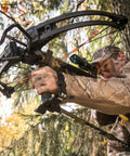 Hunter using Hip Shot Crossbow Shooting Rest Lightweight Stable Portable Telescopic Versatile Support in camouflage gear outdoors