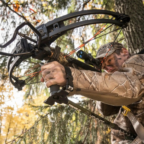 Hunter using Hip Shot Crossbow Shooting Rest Lightweight Stable Portable Telescopic Versatile Support in camouflage gear outdoors
