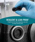 Black Silicone Round Hole Plugs 10 Pack No Fuss Flexible Stopper shown in hand during installation on appliance panel