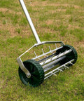 57 Inch Push Spike Lawn Aerator Roller with One Point Four Inch Galvanized Steel Spikes on Grass