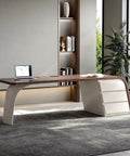 Slick Oversized L Shaped Home Office Desk With Solid Wood Base And Deep Storage Drawers Large Rock Board Top from a side angle.