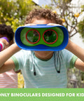 Child using Focus Free Binoculars For Kids Aged 4 To 8, Lightweight And Durable Outdoor Toy Gear With Neck Strap outdoors.
