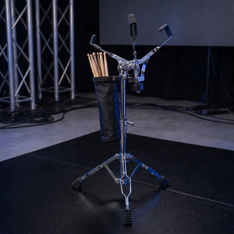 Killer Double Braced Snare Drum Stand With Stick Sleeve, showcasing heavy-duty rubber tripod for stability in garage jams.