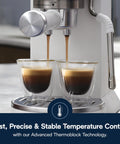 Compact Espresso And Cold Brew Coffee Maker Featuring Built In Milk Frother Wand For Next Level Iced Lattes Smooth Hot Drinks And Straight Up Barista Quality Blends Daily brewing espresso into double glass cups.