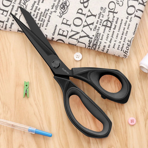 Black Titanium Fabric Scissors For Dressmaking Pro Grade Heavy Duty Multipurpose Shears With Titanium Coated Blades And Soft Grip Handles 25cm Cutting Tool For Seamstresses Tailors And Craft Projects on wood