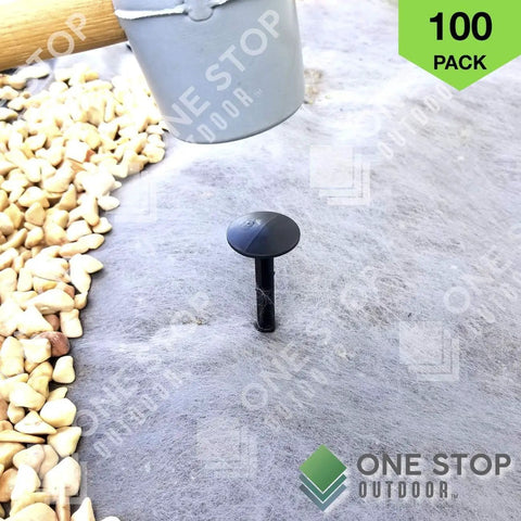 Heavy Duty 4 Inch Landscape Spikes For Weed Fabric Tarps And Erosion Control Durable Plastic Stakes Pack Of 100 shown in use