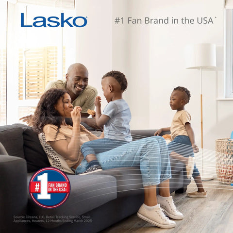 Family enjoying cool air from Lasko fan, #1 fan brand in USA, relaxing on sofa in bright living room.