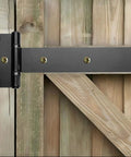 Industrial Strength 12 Inch T Strap Gate Hinges 4mm Thick 180 Degree Swing Rust Proof Black Steel installed on wooden gate