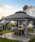 13x13 Pop Up Gazebo With Mosquito Netting One Push Setup No Tools Needed Ventilated Roof For Fresh Air Sturdy Frame Ideal For Patio Garden Or Backyard Dark Gray with people dining underneath in a backyard setting.