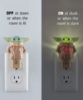 Baby Yoda Night Light Plug In With Dusk To Dawn Sensor Grogu The Child LED Lamp showing on and off modes in room outlet