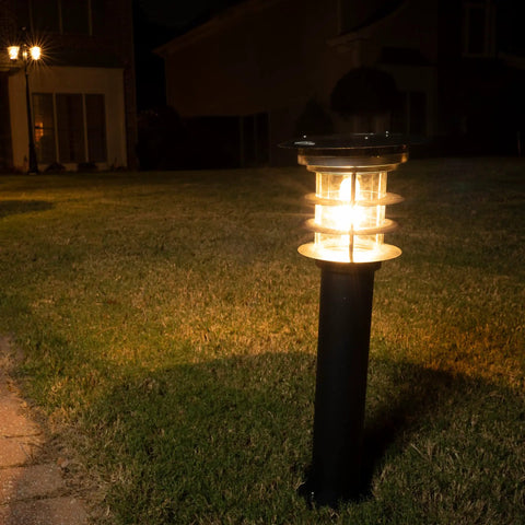 Solar Pathway Light With Stainless Steel Bollard, Waterproof Outdoor Landscape LED Lamp illuminating a garden pathway at night