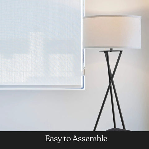 LED Floor Lamp Tall Tripod With Drum Shade In Black Finish And Gold Accents, shown against a white wall.