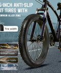 Beefy Fat Tire 26-Inch Mountain Bike With 21-Speed Drivetrain, 4-Inch Fat Tires, demonstrated on a road surface, purple frame
