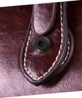 Close-up of black stainless steel binding screw installed in leather using Top Shelf Five Piece Pack Of Black Stainless Steel Binding Screws And Nuts For Scrapbooks Photo Albums And Bookbinding With Countersunk Flat Head For No Sweat Setup.