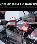 Two Piece Auto Fire Extinguisher Stickers With Heat Sensitive Aerosol Tech being demonstrated in an engine bay for safety.