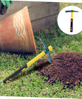 Yellow Plastic-Clad Pickaxe With Lightweight Fiberglass Handle For Gardening next to mounded soil and empty flower pot