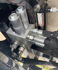 Close-up of hose connectors on Beefy Skid Steer Tree Pruner Attachment With 42 Inch Brush Cutter, heavy-duty use