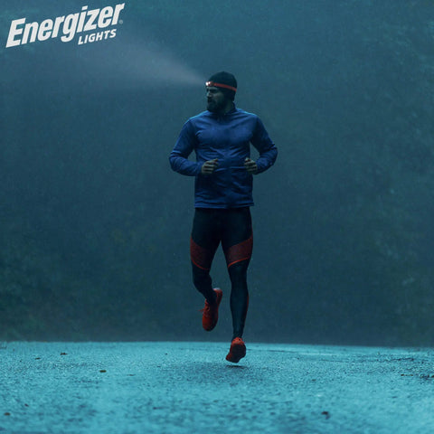 Runner at night wearing Pro-315 LED Headlamp With IPX4 Water Resistance All Weather Hands Free Light For Outdoors Camping Running
