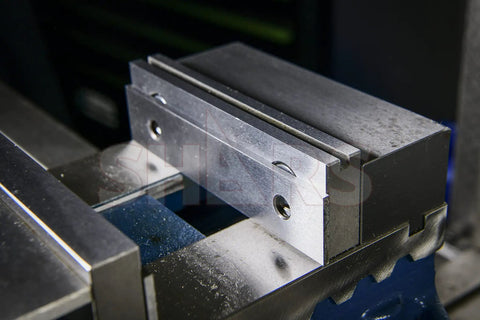 One Eighth Inch Precision Steel Parallels, 6 Inch Long, 10 Pair Set, ground and hardened, shown installed in machine setup