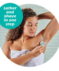 Woman using Intuition Go Disposable Razor For Sensitive Skin With BuiltIn Moisturizing Aloe Bar 4Fold Pivoting Head Womens Travel Razor