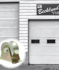 Four Piece Heavy Steel V Groove Caster Wheels For Sliding Gates And Store Doors With Precision Machined Pulley Block close-up on steel wheel with bracket.