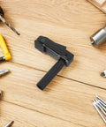Black Multifunctional Aluminum Woodworking Desktop Clamp With Quick Clamping on wooden surface with tools around
