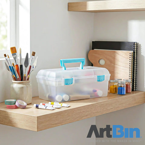 Essentials Lift Out Tray Box For Arts And Crafts Supplies Portable Organizer with handle, clear aqua, on shelf with art tools