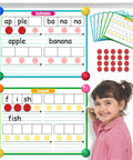 Child using Giant Phonics Dry Erase Cards Six Pack For Phonemic Awareness And Syllable Practice with counters on board