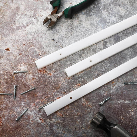3 UHMW bars for jigs and tablesaw with tools and screws on a textured surface; 4 Pcs UHMW Precision Milled Bar For Jigs Crosscut Sled For Table Saw Sled Fixtures Or Miter Slots Three Quarters By Three Eighths Inch 17 Inch Long Miter Bar Slider Gauge Rod For Router And Bandsaw Use visible