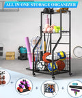 Mobile Garage Sports Gear Organizer With Wheels Three Tier Ball Rack For Basketballs Footballs And Mats Heavy Duty Storage Rack With Hooks Anti Slip Shelves Space Saving Indoor And Outdoor Gear Organizer For All Your Sports Equipment in a garage setting.
