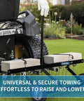 48 Inch Tow Behind Lawn Dethatcher Rake With 24 Spring Steel Tines And Lift Handle attached to an ATV with blocks for weight