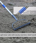 Heavy Duty Bow Rake With 60 Inch Stainless Steel Handle For Lawn Care, 14 Tines Rake at work on soil