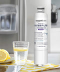 Samsung DA29-00020B Refrigerator Water Filter Cartridge positioned on a kitchen counter next to a glass of lemon water