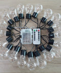 Battery Operated 25 Feet 100 LED Warm White Hanging String Lights With 20 Bulbs Remote Dimmable Eight Modes Memory Timer Waterproof And Shatterproof For Indoor Outdoor Decor Perfect For Bedroom Patio Balcony Home And Christmas Party displayed on wooden surface
