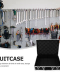 Open Portable Aluminum Toolbox With Lock Sleek Rigid Case For Small Tools Hardware Gear on a storage wall filled with tools.