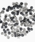 120 Set Sew-On Metal Snap Buttons Pack With 8mm And 10mm Sizes In Black And Silver scattered on white surface
