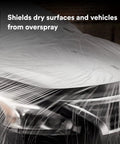 Close-up of a car front covered with overspray protective sheeting for painting, translucent high density tear-resistant masking film.