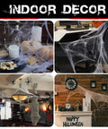 Premium Super Stretchy Halloween Spider Webs Covering 1400 Square Feet With 150 Extra Fake Spiders used for indoor decor setups.