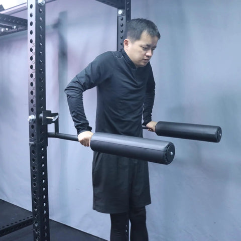 Man using Nordic Leg Roller For Rack Mounted Pro Grade Home Gym, Bulgarian Split Squat Accessory And Nordic Hamstring Curl Attachment